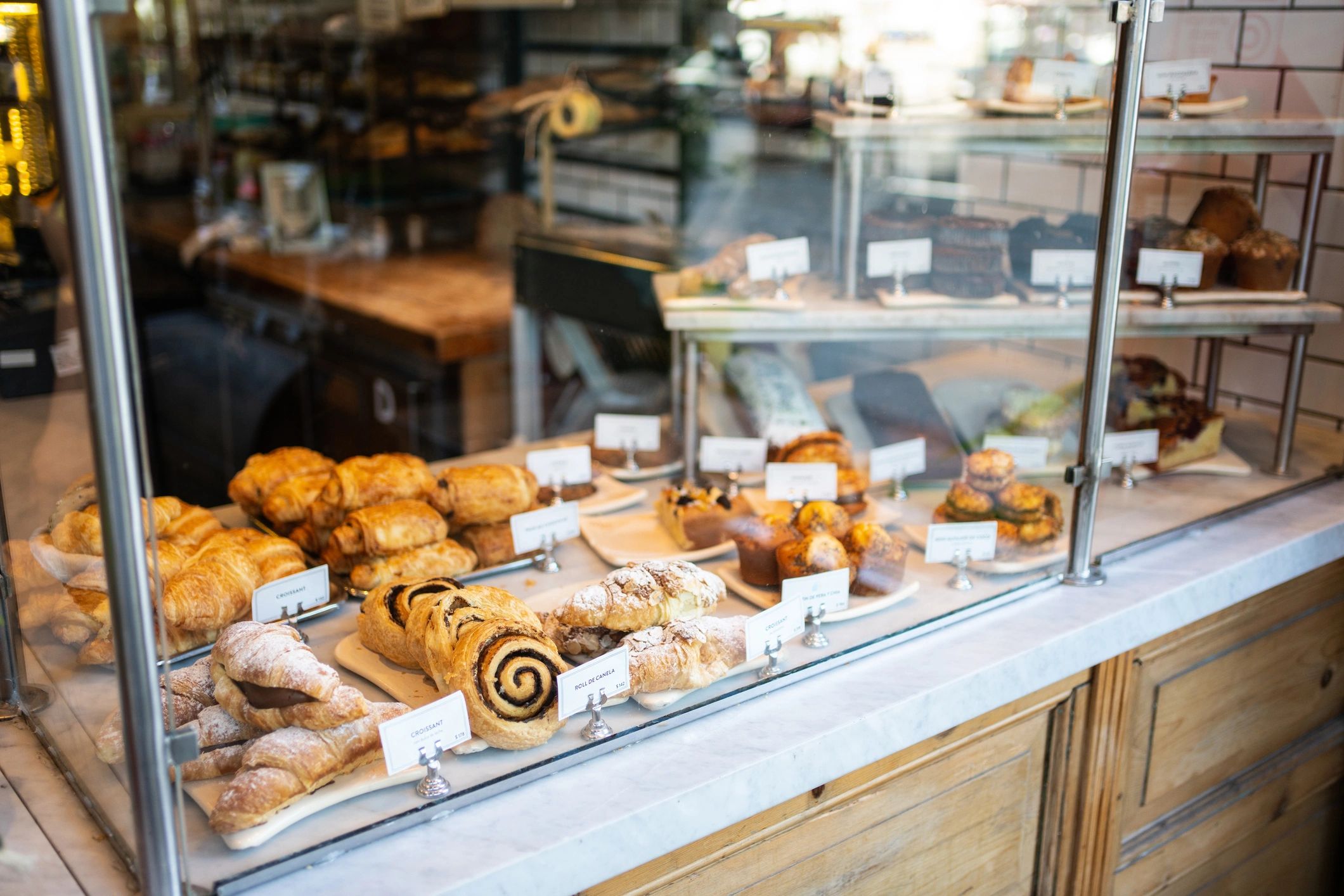 Various baked goods in a bakery display case